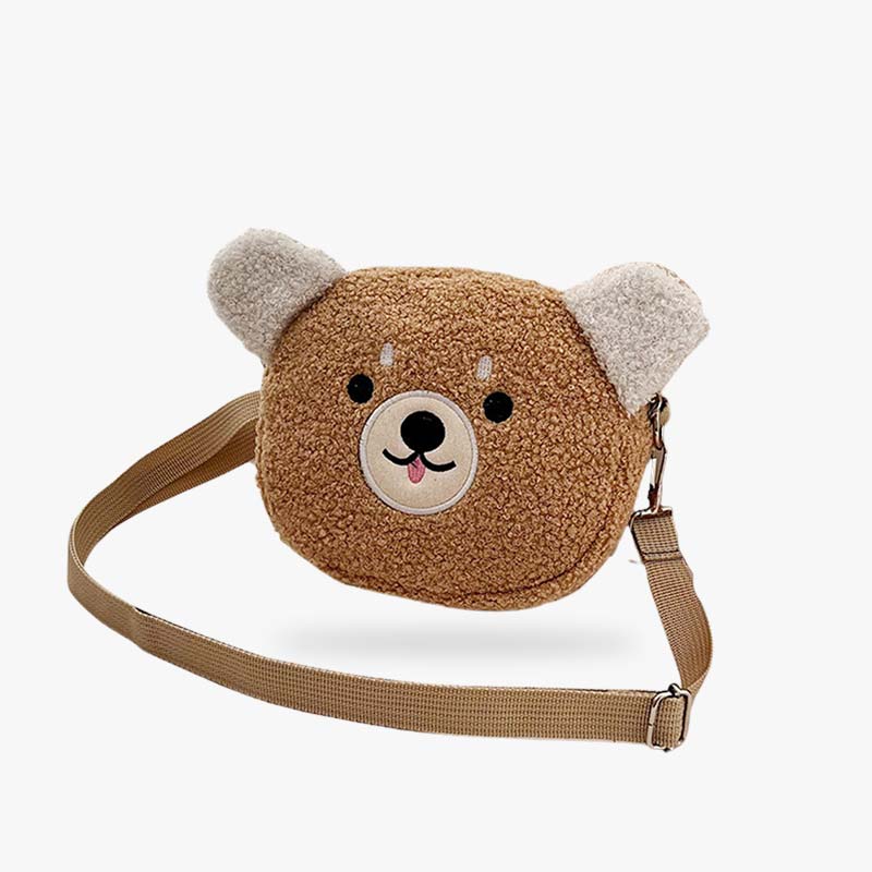 Ce sac japonais kawaii est en forme de tête d'ourson de couleur Khaki. C'est un sac bandoulière mignon avec un matière douce et moletonnée