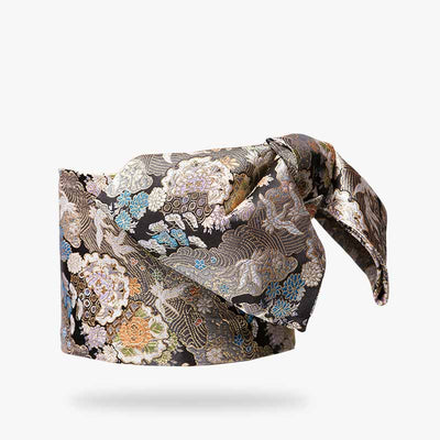 cette ceinture kimono obi est brodée avec des symboles japonais traditionnals. C' est une ceinture de geisha qui ferme le kimono japonais pour femme