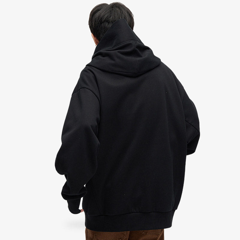 Hoodie oversize homme Japon noir en coton de qualité, au style minimaliste inspiré du streetwear Harajuku, parfait pour un look décontracté et tendance.